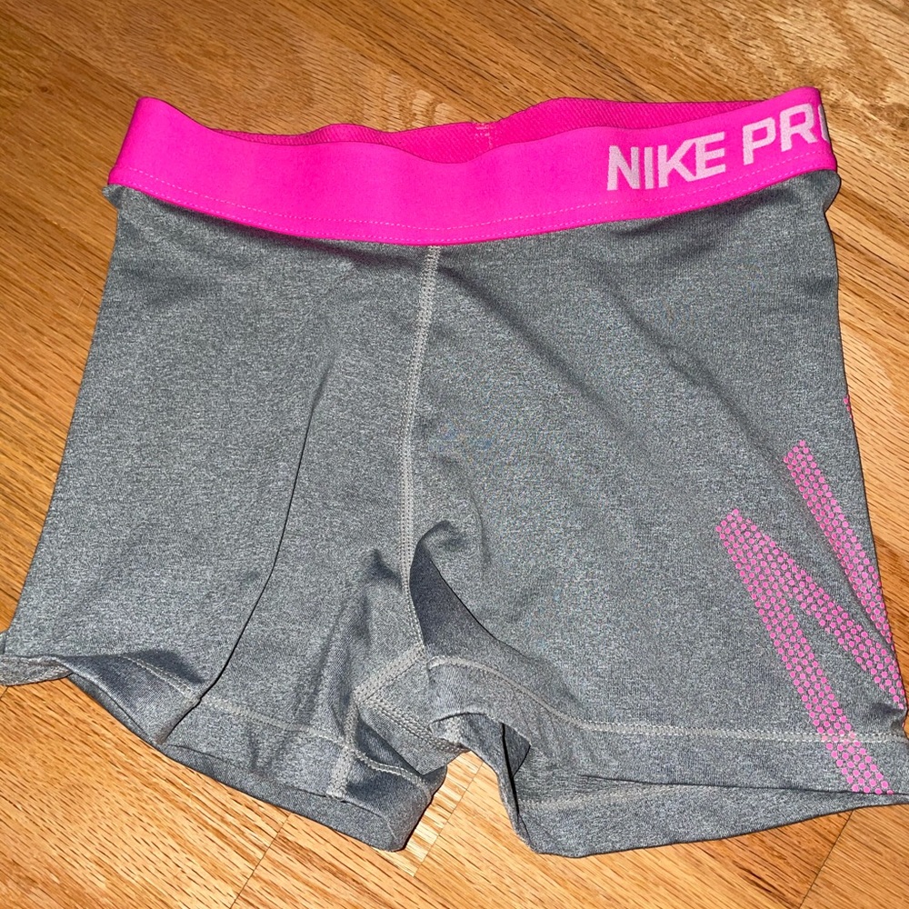 Pink and grey Nike pro shorts